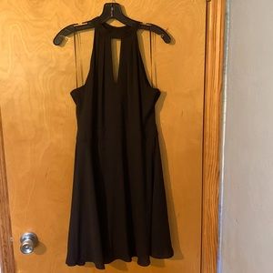 Express black dress. Has black rayon slip underneath. Keyhole top.